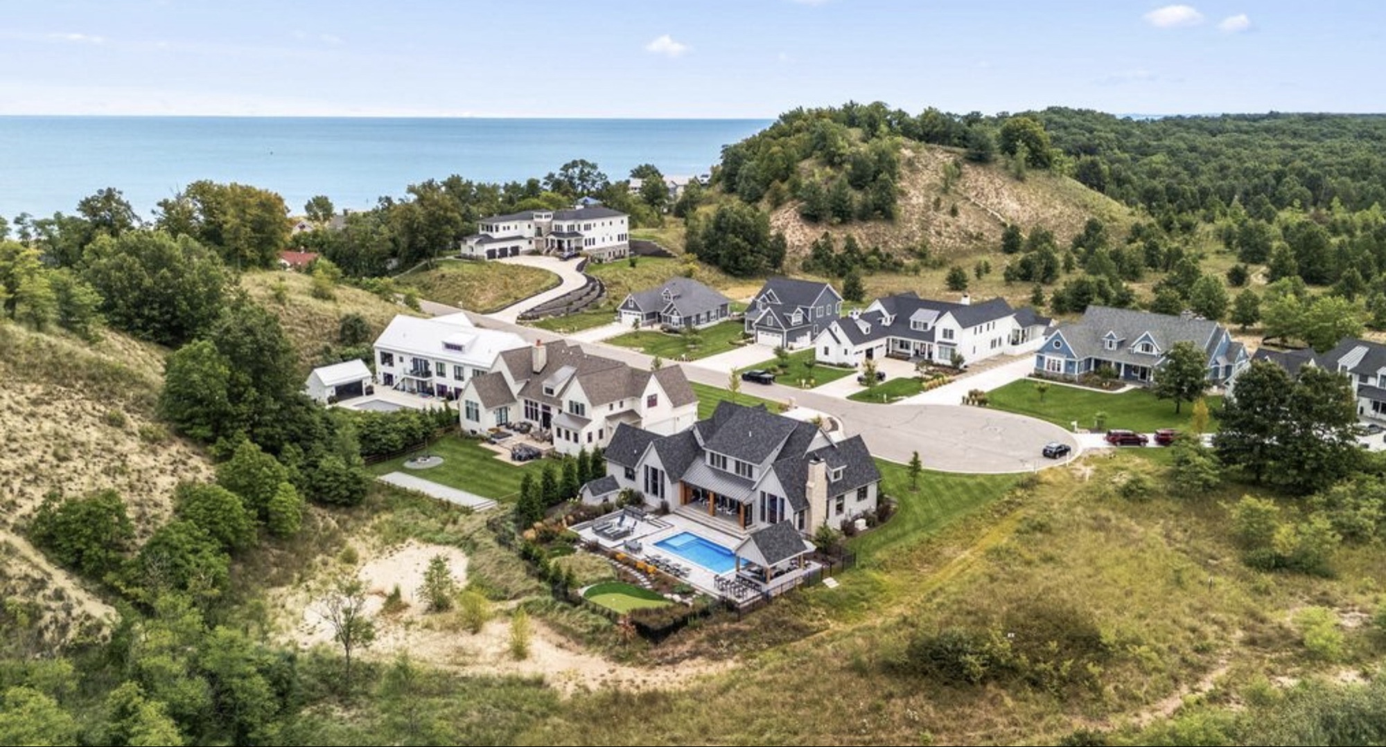 Aerial view of Whisper Dunes — 10 finished luxury homes along Whisper Dunes Drive, immediately adjacent to Indiana Dunes Club.